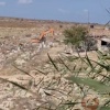 الاحتلال يواصل تجريف أراضي المواطنين في المنطقة الغربية من دير بلوط