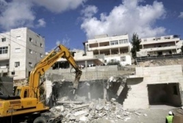 "الجدار والاستيطان": 869 عملية هدم واقتلاع وتكسير 6507 شجرات خلال العام الماضي