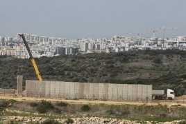إسرائيل تبني جدارا اسمنتيا جديدا شمال الضفة