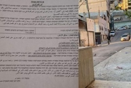 الاحتلال يخطر بهدم بناية سكنية في مخيم شعفاط شمال القدس