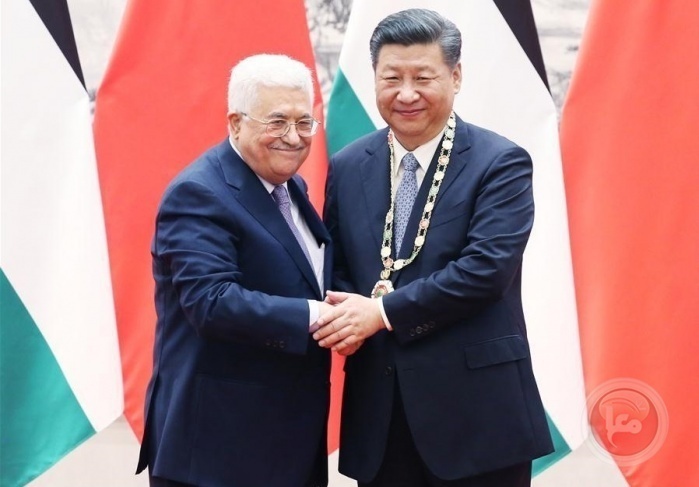 وزير الخارجية الصيني وانغ يي والرئيس محمود عباس