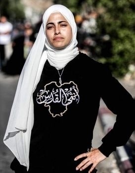 الناشطة منى الكرد